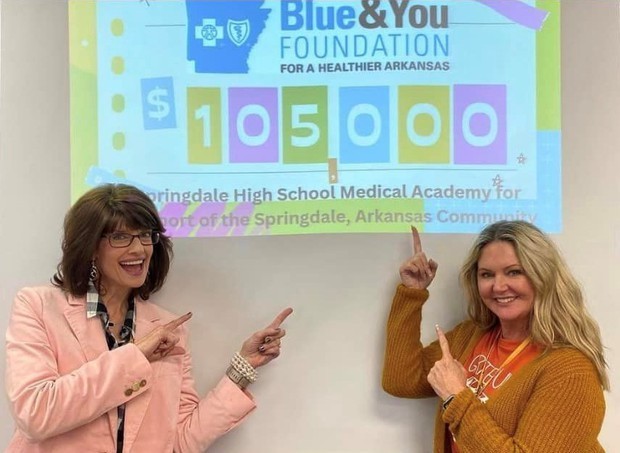 Ellen Tidwell and Robin Pinkley, Springdale High School Medical Academy instructors,  celebrate the academy's $105,115 grant.