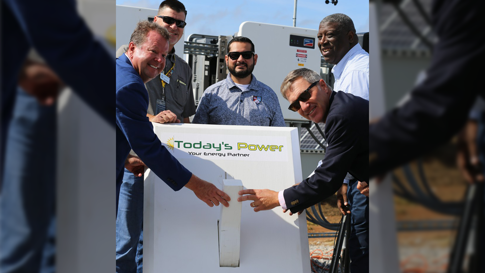 (From Left to Right) Mitchell Johnson, Ozarks Electric president and CEO; Randy Hutchinson, Springdale School Board president; Eddie Ramos, Springdale School Board member; Jared Cleveland, Springdale Public Schools superintendent; and Derek A. Dyson, Today’s Power president and CEO, flip the ceremonial switch Aug. 22, 2022, for the new 2.375-megawatt solar and battery storage facility near Sonora Middle School.