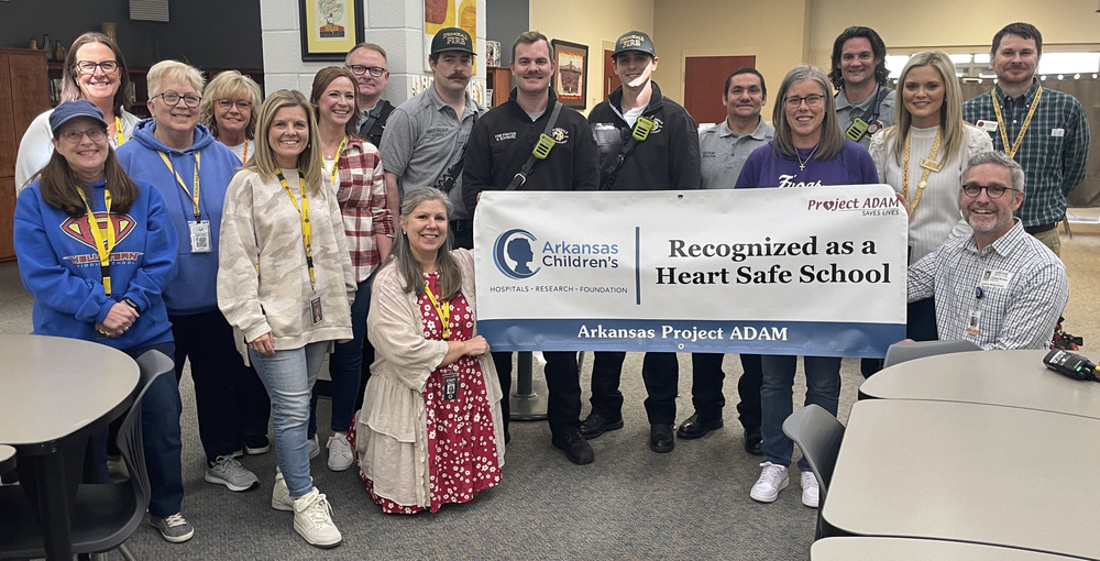 Hellstern Middle School staff practice emergency cardiac arrest response skills as part of the Heart Safe School designation process.