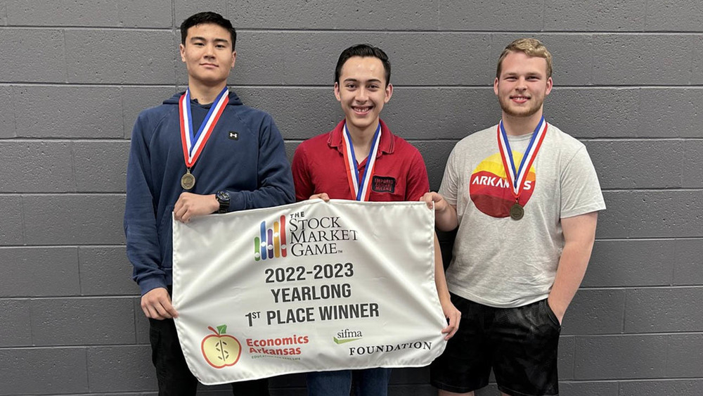 (Left to Right) Bruce Quayle, Daniel Paxton and Logan Roberts took first place in the 2022-23 Security/Financial Market Association Foundation Stock Market Game.