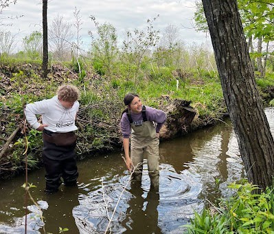 Zane Turner and Katelyn Spurlock of Lakeside Junior High School spend time in the field researching a flood prevention project.