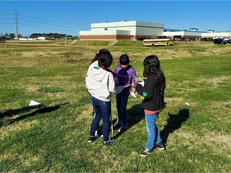 Mrs. Weingart's 5th grade students constructed, flew and measured paper airplanes. 
