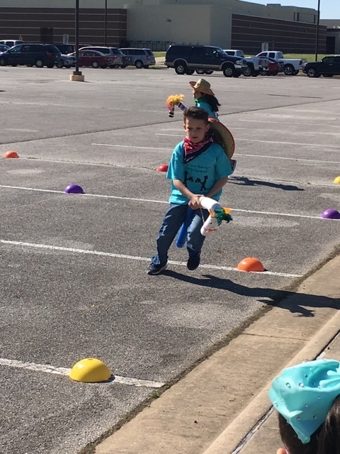 Students participating in Stick Horse Rodeo Games