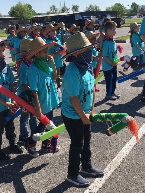 Students participating in Stick Horse Rodeo Games